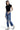 SaltTree model wearing Mica Denim high-rise straight crop jeans with heavy distressing and a frayed step hem.