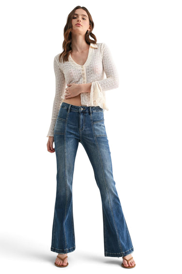 SaltTree Mica Denim high-rise flared jeans in vintage wash with vertical front seam detailing on a female model