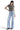 SaltTree Mica Denim super high rise light blue loose straight jeans with whiskering on a model wearing black heels