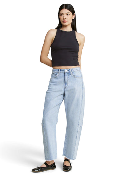 SaltTree Mica Denim light wash super high rise barrel leg jeans with curved seams and raw hem on a model