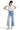 Model wearing SaltTree Mica Denim light wash super high rise cropped wide leg jeans with front patch pockets