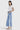 SaltTree model wearing Mica Denim super high rise light wash wide leg cropped jeans with a raw hem and side pockets