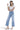 SaltTree model wearing Mica Denim light wash super high rise cropped wide leg jeans with a white t-shirt