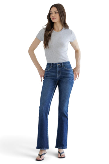 SaltTree Mica Denim mid-rise bootcut jeans in dark indigo with whiskering worn by a model with a grey t-shirt