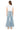 SaltTree Mica Denim high rise palazzo crop jeans in medium wash with wide leg fit, back view on model