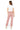 SaltTree Mica Denim high rise pink jogger pants with cuffed ankles and back pockets worn by a model from behind.