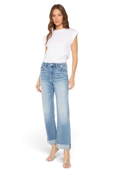SaltTree model wearing Mica Denim high-rise straight leg jeans in medium-light wash with a folded hem and white tee