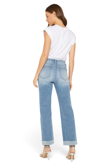 SaltTree Mica Denim high-rise straight leg jeans in medium-light wash with folded hems worn by a model from behind