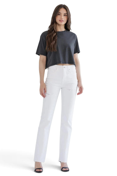 Model wearing SaltTree Mica Denim high rise white slim straight jeans with tummy tuck waistband and cropped black tee.