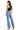 SaltTree Mica Denim super high rise wide leg jeans in medium blue wash with raw hem worn by a model