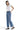SaltTree Mica Denim high rise wide leg jeans in medium blue with a distressed raw hem worn by a model.