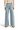 SaltTree Miou Muse high rise wide leg crop pants in light wash stretch twill with a raw hem, back view.