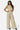 SaltTree Love Poem off white crinkled plisse crop top and wide-leg pant set with subtle rhinestone embellishments.