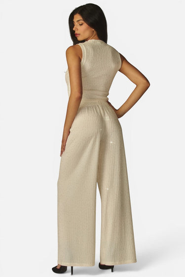 SaltTree Love Poem off white crinkled plisse crop top and wide-leg pant set with rhinestone embellishments on a model