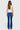 SaltTree ONE HUNDRED B high rise bootcut jeans in medium wash denim seen from the back on a model