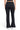 Model wearing SaltTree Reflex black fleece flared joggers with an elasticized waist, viewed from the back.