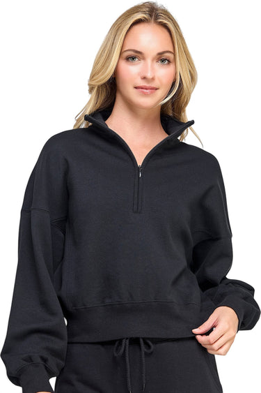 SaltTree model wearing a black Reflex fleece half-zip sweatshirt with a mock neckline and relaxed fit.