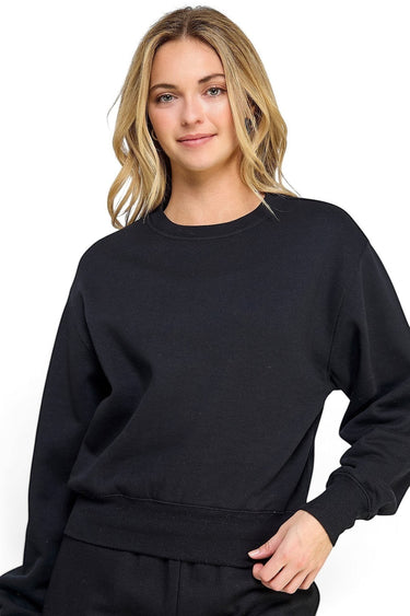 SaltTree Reflex black fleece sweatshirt with crew neckline and ribbed trims worn by a blonde model