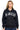 SaltTree Reflex black oversized fleece zip-up hoodie with white Los Angeles varsity print on a model
