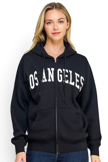 SaltTree Reflex black oversized fleece zip-up hoodie with white Los Angeles varsity print on a model