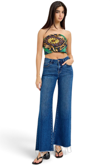 Model wearing SaltTree Risen Jeans dark wash high rise wide leg denim with tummy control and frayed raw hem