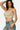 SaltTree model wearing a stone-colored Love Poem ribbed seamless strapless tube top with blue denim jeans