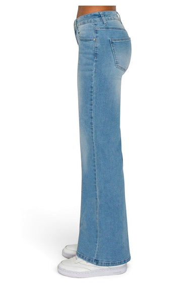 SaltTree Wax Jean low-rise wide leg jeans in medium blue comfort-stretch denim, side view on a model