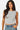 SaltTree Love Poem white sleeveless boatneck top in smoothing contour jersey fabric worn by a model