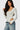 SaltTree Love Poem white long sleeve scoop neck bodysuit in double-layer smoothing fabric worn by a model.
