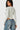 SaltTree Love Poem white long sleeve scoop neck bodysuit on a model wearing blue denim jeans