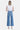 SaltTree Flying Monkey medium wash high rise slim wide leg jeans with raw hem and distressed detailing.