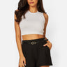 Love Poem dream state scuba belted shorts in black on a model
