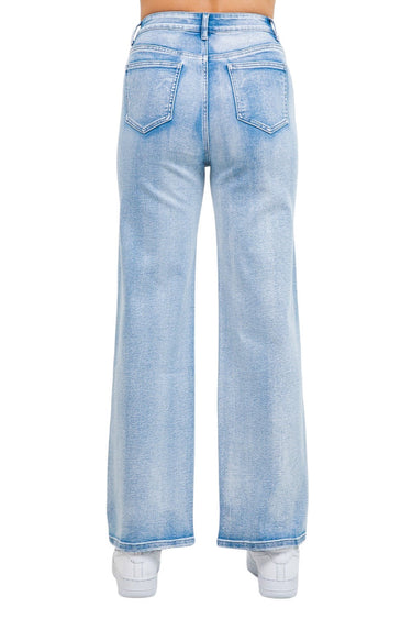 SaltTree American Bazi light blue wash wide leg jeans with back pockets, worn by a model in white sneakers.