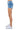 SaltTree American Bazi medium blue denim shorts with rhinestone trim in a slim mini fit, side view on model.