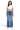 SaltTree American Bazi medium blue wash wide leg jeans with rhinestone trim on a model wearing a white cropped tee