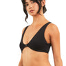 Model wearing a black SaltTree ANWND scoop neck front hook bralette with wide straps and gathered detail