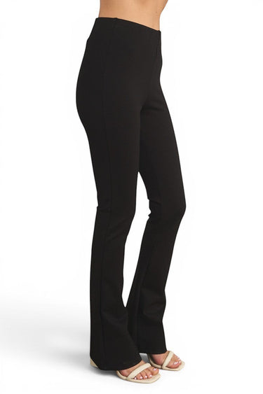 SaltTree ANWND black high-waisted ponte flare pants worn by a model in a side profile view
