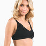 SaltTree ANWND black ribbed V-neck bra top with a one-strap back worn by a blonde model