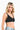 SaltTree ANWND black ribbed V-neck bra top with a one-strap back worn by a blonde model