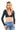 SaltTree ANWND black ribbed long sleeve crop top with a deep V-neckline worn by a blonde model with blue jeans