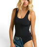 SaltTree ANWND black seamless scoop neck sleeveless bodysuit worn by a blonde model with denim jeans