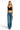 SaltTree model wearing an ANWND black seamless deep V-neck crop bralette with adjustable straps and blue denim jeans