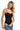 SaltTree model wearing a black ANWND sweetheart neckline bodysuit with adjustable spaghetti straps and fitted design.