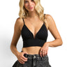 SaltTree ANWND black seamless V-neck cami top with center-front trim worn by a blonde model