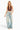 SaltTree ANWND brown halter crop top with deep V-neck, shirred bust, and ribbed waistband worn with light wash jeans