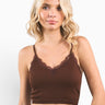 SaltTree model wearing a brown ANWND ribbed crop cami with delicate lace-trim neckline and adjustable straps.
