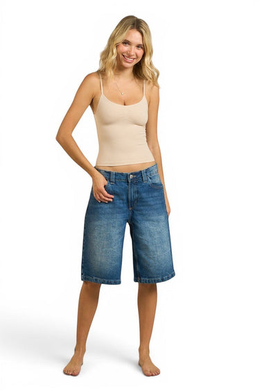 SaltTree ANWND nude seamless cami top with spaghetti straps and shirred bust worn by a model with denim shorts