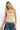 Model wearing a SaltTree ANWND nude seamless cami top with spaghetti straps and a shirred bust detail
