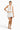 SaltTree model wearing a white ANWND halter crop top with a deep V-neck, shirred bust, and ribbed wide waistband.