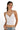 SaltTree ANWND white ribbed cropped camisole with a low V-neckline and adjustable spaghetti straps on a model